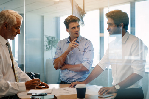 Two men are in conference room