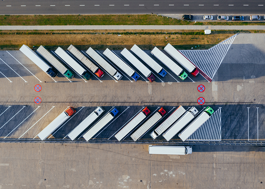 Aerial view of a commercial truck weighing station.