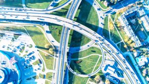An aerial shot of interweaving highways, symbolizing how Pivotree ecommerce managed services adapt to your needs.
